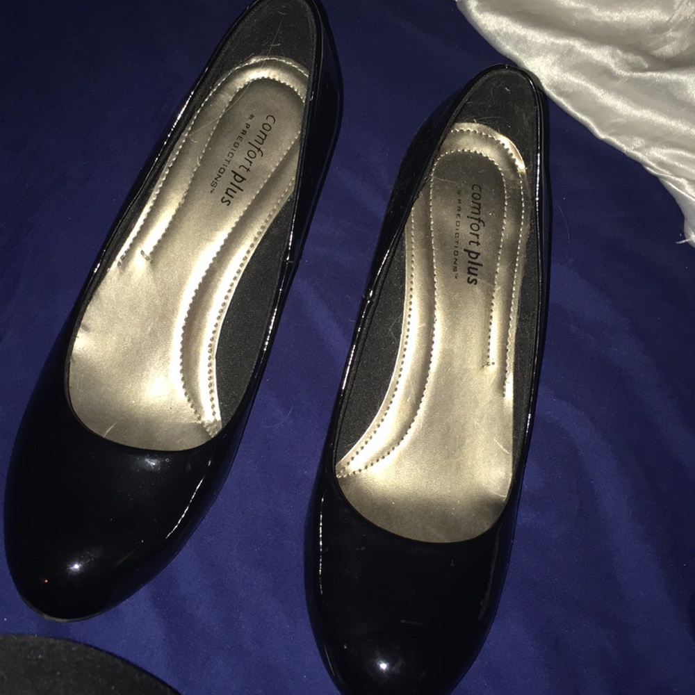 A pair of black heels